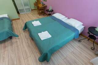 Апартаменты Пио Санкт-Петербург Четырехместный номер-2